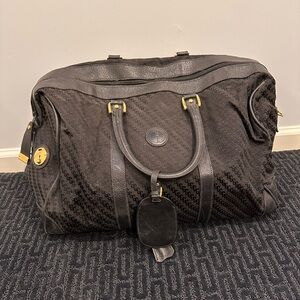 Vintage Gucci Black Duffel Bag with Gold Details